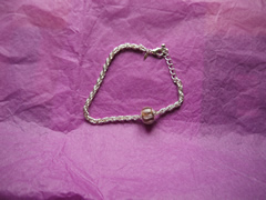 Bracelet with pink stripe bead